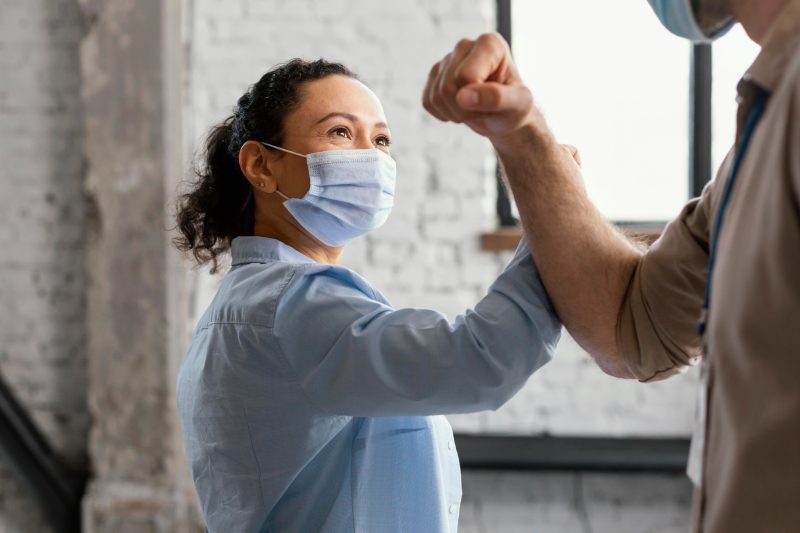 close-up-people-elbow-touch 1